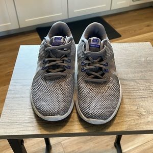 Gray Nike running shoes size 8 in woman’s